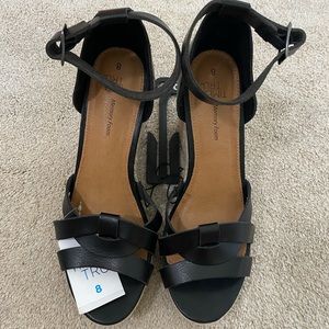 Black wedge sandals.